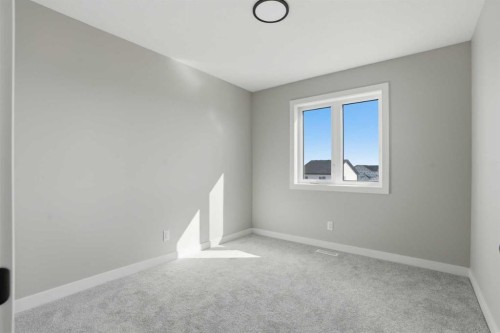 229 Bridgeport Gate, Chestermere, AB - Indoor Photo Showing Other Room
