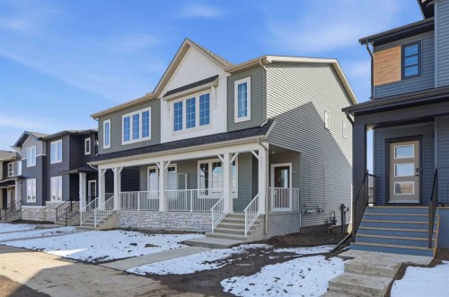 229 Bridgeport Gate, Chestermere, AB - Outdoor With Deck Patio Veranda With Facade