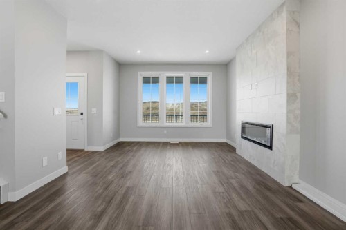 229 Bridgeport Gate, Chestermere, AB - Indoor With Fireplace