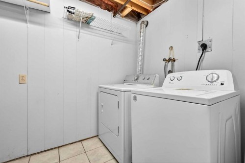 159 Shawglen Road Sw, Calgary, AB - Indoor Photo Showing Laundry Room