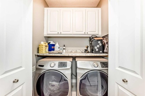 201 Aspenmere Way, Chestermere, AB - Indoor Photo Showing Laundry Room
