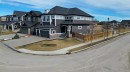 201 Aspenmere Way, Chestermere, AB  - Outdoor With Facade 