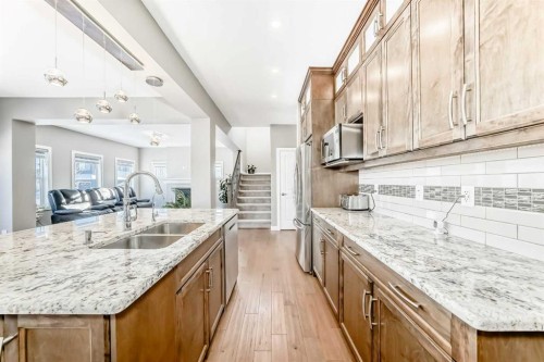 201 Aspenmere Way, Chestermere, AB - Indoor Photo Showing Kitchen With Double Sink With Upgraded Kitchen