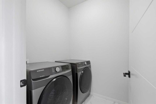 119 Carrington Circle Nw, Calgary, AB - Indoor Photo Showing Laundry Room