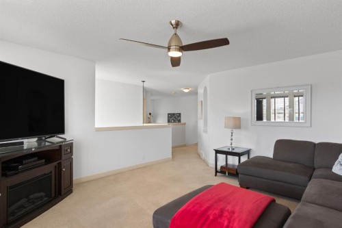 125 Seagreen Manor, Chestermere, AB - Indoor Photo Showing Living Room