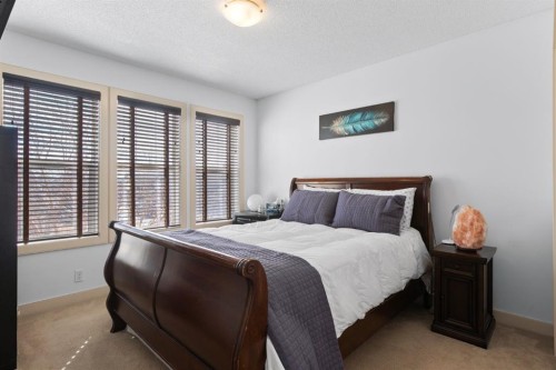 125 Seagreen Manor, Chestermere, AB - Indoor Photo Showing Bedroom