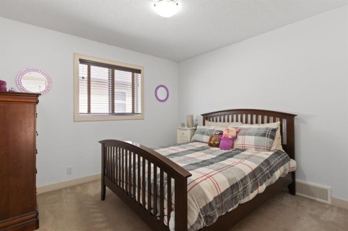 125 Seagreen Manor, Chestermere, AB - Indoor Photo Showing Bedroom