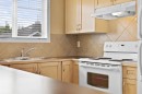 8318-70 Panamount Drive Nw, Calgary, AB  - Indoor Photo Showing Kitchen With Double Sink 