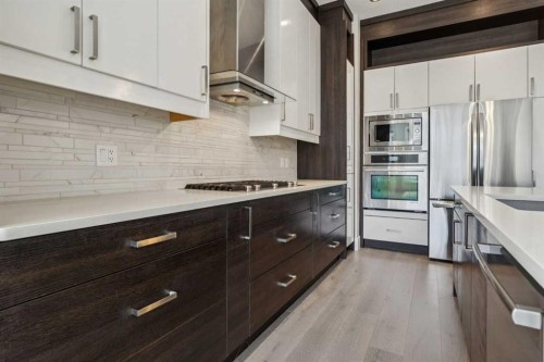 1104A Regent Crescent Ne, Calgary, AB - Indoor Photo Showing Kitchen With Stainless Steel Kitchen With Upgraded Kitchen