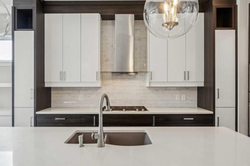 1104A Regent Crescent Ne, Calgary, AB - Indoor Photo Showing Kitchen With Double Sink With Upgraded Kitchen