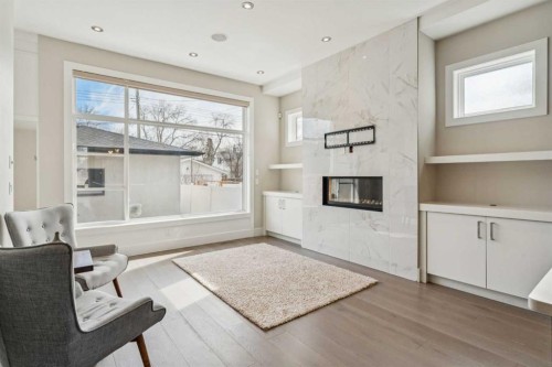 1104A Regent Crescent Ne, Calgary, AB - Indoor With Fireplace
