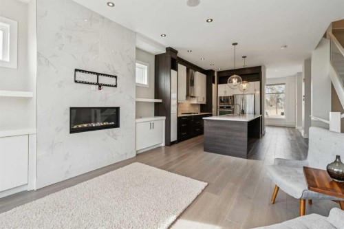 1104A Regent Crescent Ne, Calgary, AB - Indoor With Fireplace