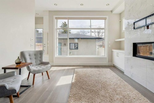 1104A Regent Crescent Ne, Calgary, AB - Indoor With Fireplace