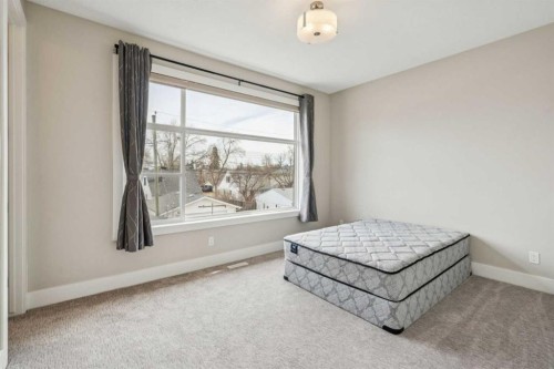1104A Regent Crescent Ne, Calgary, AB - Indoor Photo Showing Bedroom