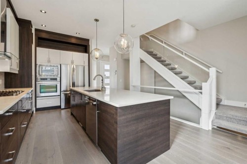 1104A Regent Crescent Ne, Calgary, AB - Indoor Photo Showing Kitchen With Stainless Steel Kitchen With Upgraded Kitchen