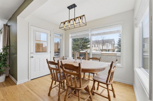 412 Sheep River Point, Okotoks, AB - Indoor Photo Showing Dining Room