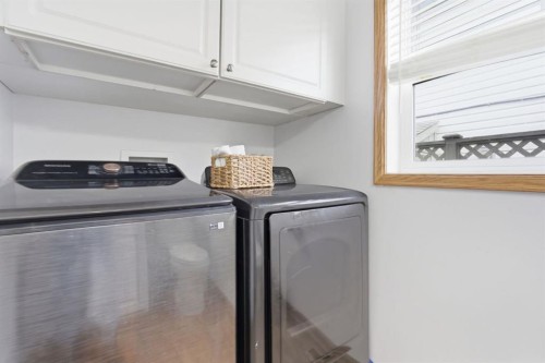 412 Sheep River Point, Okotoks, AB - Indoor Photo Showing Laundry Room