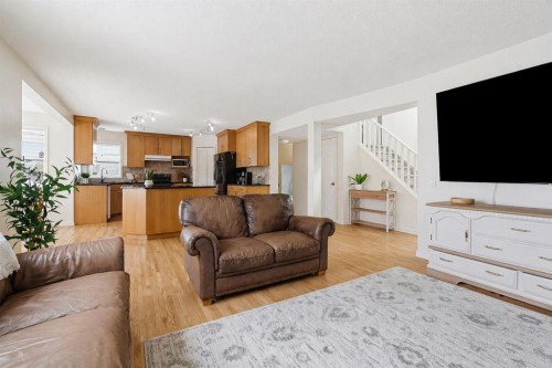 412 Sheep River Point, Okotoks, AB - Indoor Photo Showing Living Room