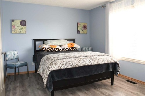 66 Cramond Circle Se, Calgary, AB - Indoor Photo Showing Bedroom