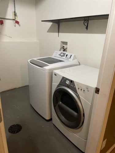 149 Hidden Ranch Road Nw, Calgary, AB - Indoor Photo Showing Laundry Room
