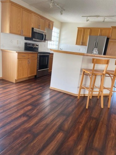 149 Hidden Ranch Road Nw, Calgary, AB - Indoor Photo Showing Kitchen