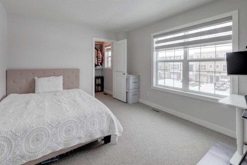 546 Sherwood Boulevard Nw, Calgary, AB - Indoor Photo Showing Bedroom