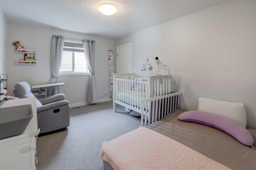 546 Sherwood Boulevard Nw, Calgary, AB - Indoor Photo Showing Bedroom