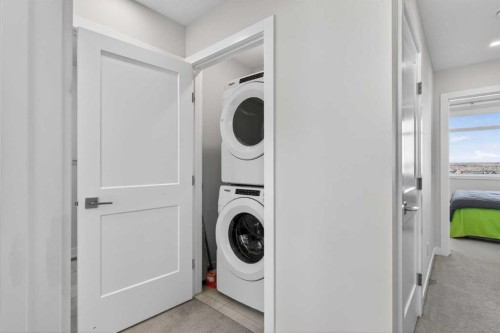 116 Crestridge Common Sw, Calgary, AB - Indoor Photo Showing Laundry Room