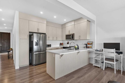 116 Crestridge Common Sw, Calgary, AB - Indoor Photo Showing Kitchen With Upgraded Kitchen