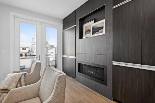 1928 27 Avenue Sw, Calgary, AB - Indoor Photo Showing Living Room With Fireplace