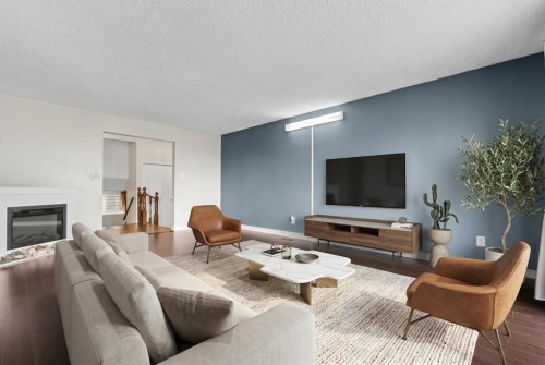 27 Beddington Road Ne, Calgary, AB - Indoor Photo Showing Living Room With Fireplace