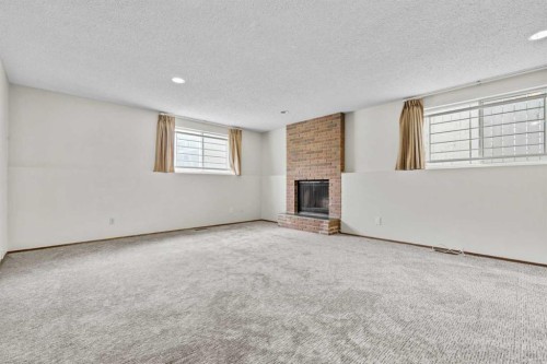 27 Beddington Road Ne, Calgary, AB - Indoor With Fireplace