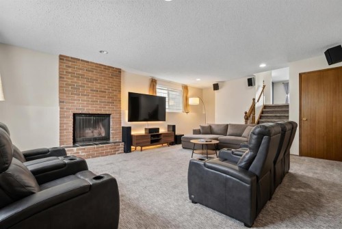 27 Beddington Road Ne, Calgary, AB - Indoor Photo Showing Living Room With Fireplace