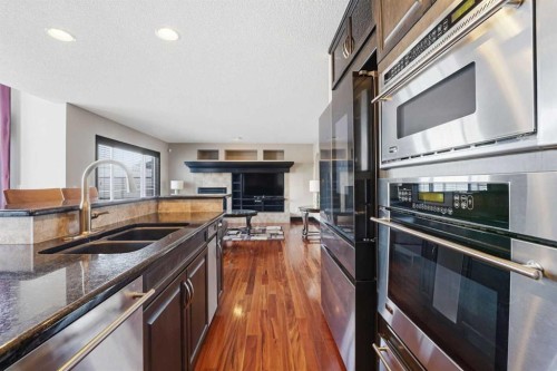 224 Everbrook Way Sw, Calgary, AB - Indoor Photo Showing Kitchen With Stainless Steel Kitchen With Double Sink