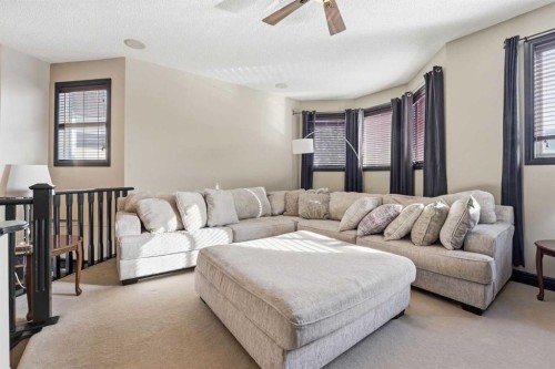 224 Everbrook Way Sw, Calgary, AB - Indoor Photo Showing Living Room
