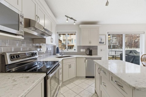 3611 Douglas Ridge Boulevard Se, Calgary, AB - Indoor Photo Showing Kitchen With Stainless Steel Kitchen