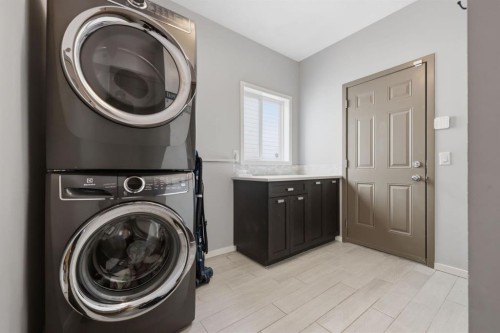 112 Evanston View Nw, Calgary, AB - Indoor Photo Showing Laundry Room