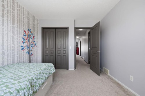 112 Evanston View Nw, Calgary, AB - Indoor Photo Showing Bedroom