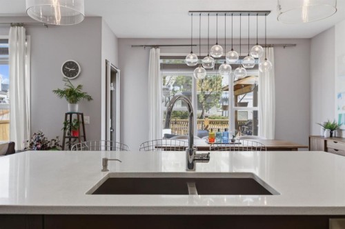112 Evanston View Nw, Calgary, AB - Indoor Photo Showing Kitchen With Double Sink