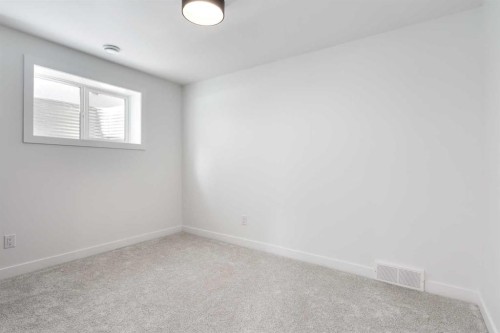 58 Edgevalley Close Nw, Calgary, AB - Indoor Photo Showing Other Room