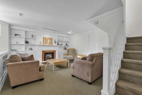 60 Inverness Square Se, Calgary, AB - Indoor With Fireplace