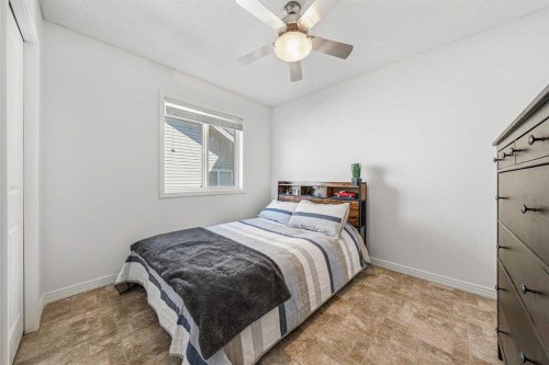 31 Jumping Pound Rise, Cochrane, AB - Indoor Photo Showing Bedroom
