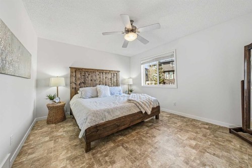 31 Jumping Pound Rise, Cochrane, AB - Indoor Photo Showing Bedroom