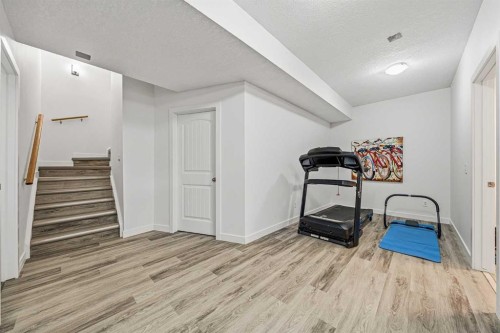31 Jumping Pound Rise, Cochrane, AB - Indoor Photo Showing Other Room