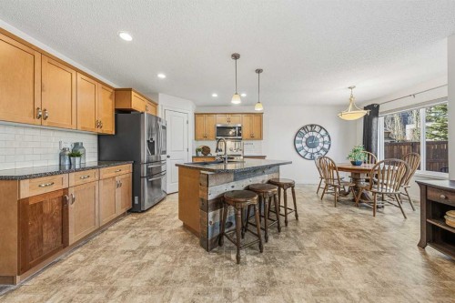 31 Jumping Pound Rise, Cochrane, AB - Indoor Photo Showing Kitchen