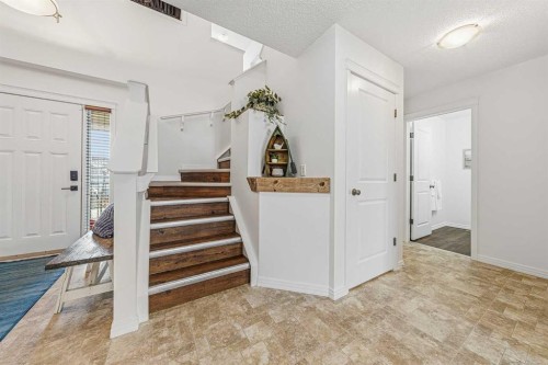 31 Jumping Pound Rise, Cochrane, AB - Indoor Photo Showing Other Room