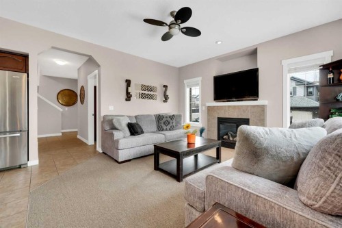 88 Silverado Saddle Avenue Sw, Calgary, AB - Indoor Photo Showing Living Room With Fireplace