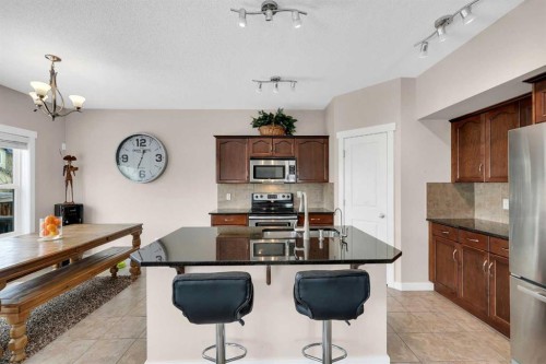 88 Silverado Saddle Avenue Sw, Calgary, AB - Indoor Photo Showing Kitchen With Stainless Steel Kitchen With Double Sink