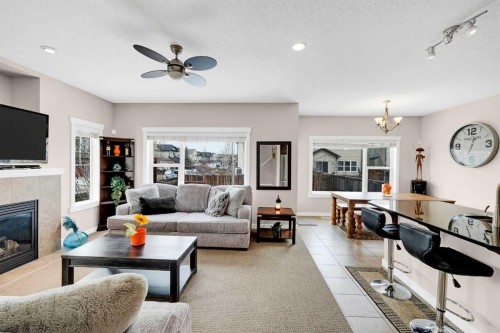 88 Silverado Saddle Avenue Sw, Calgary, AB - Indoor Photo Showing Living Room With Fireplace