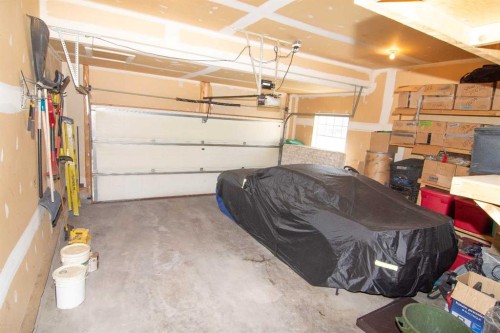 88 Silverado Saddle Avenue Sw, Calgary, AB - Indoor Photo Showing Garage